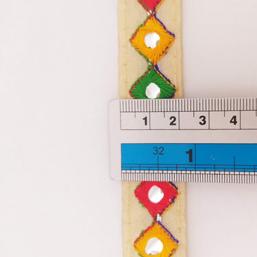 Wholesale Beige Cotton Fabric Mirrored Trim With Embroidery In Yellow, Blue, Red & Green Threads
